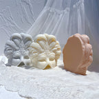 Angled feather relief castings revealing textured edges