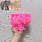 Pink silicone mold for elephant with raised trunk and broad ears