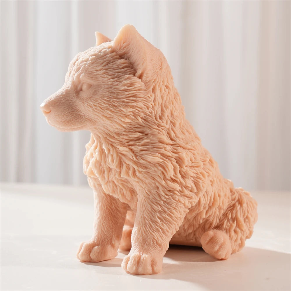 Side profile of the seated wolf cub casting