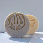 Allah crescent relief beside a Muhammad design