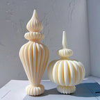 Pointed and rounded ribbed pillar candles together