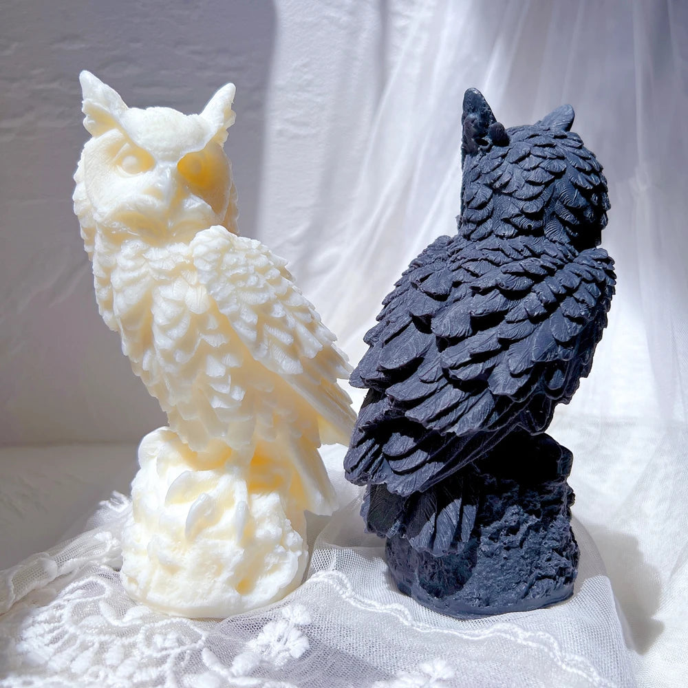 Front and rear views of owl castings showing layered back feathers