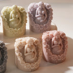 Pastel figure candles showing sculpted rose surrounds