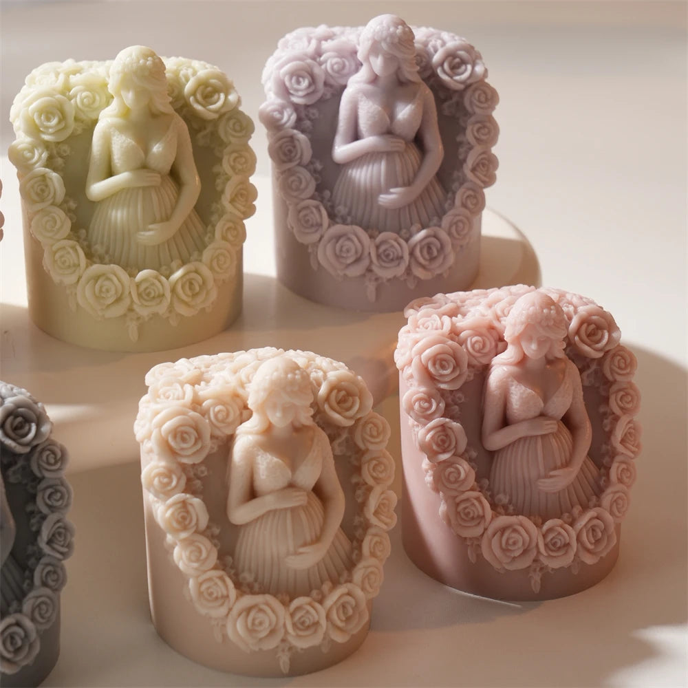 Pastel figure candles showing sculpted rose surrounds