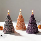 Skull-and-bow Halloween towers in gray orange and purple