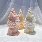 Pair of layered spruce cottage candle examples
