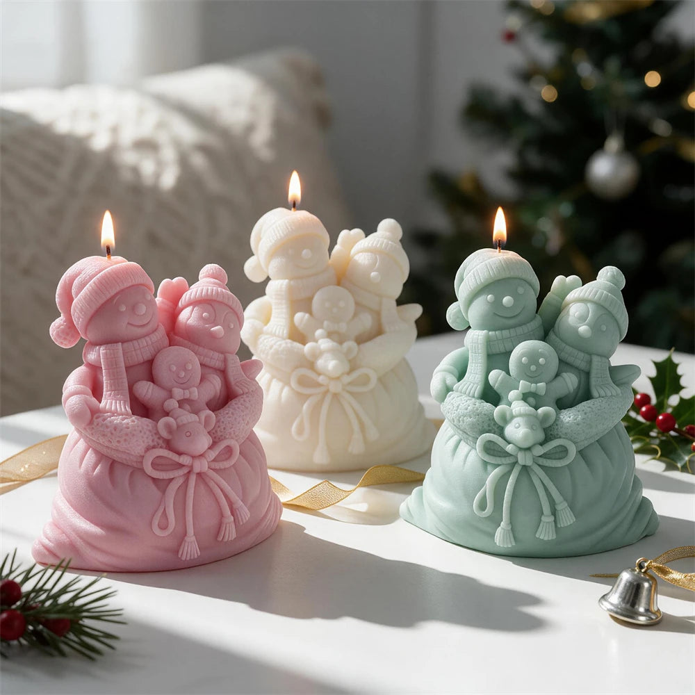 Three gift-sack candles with winter characters