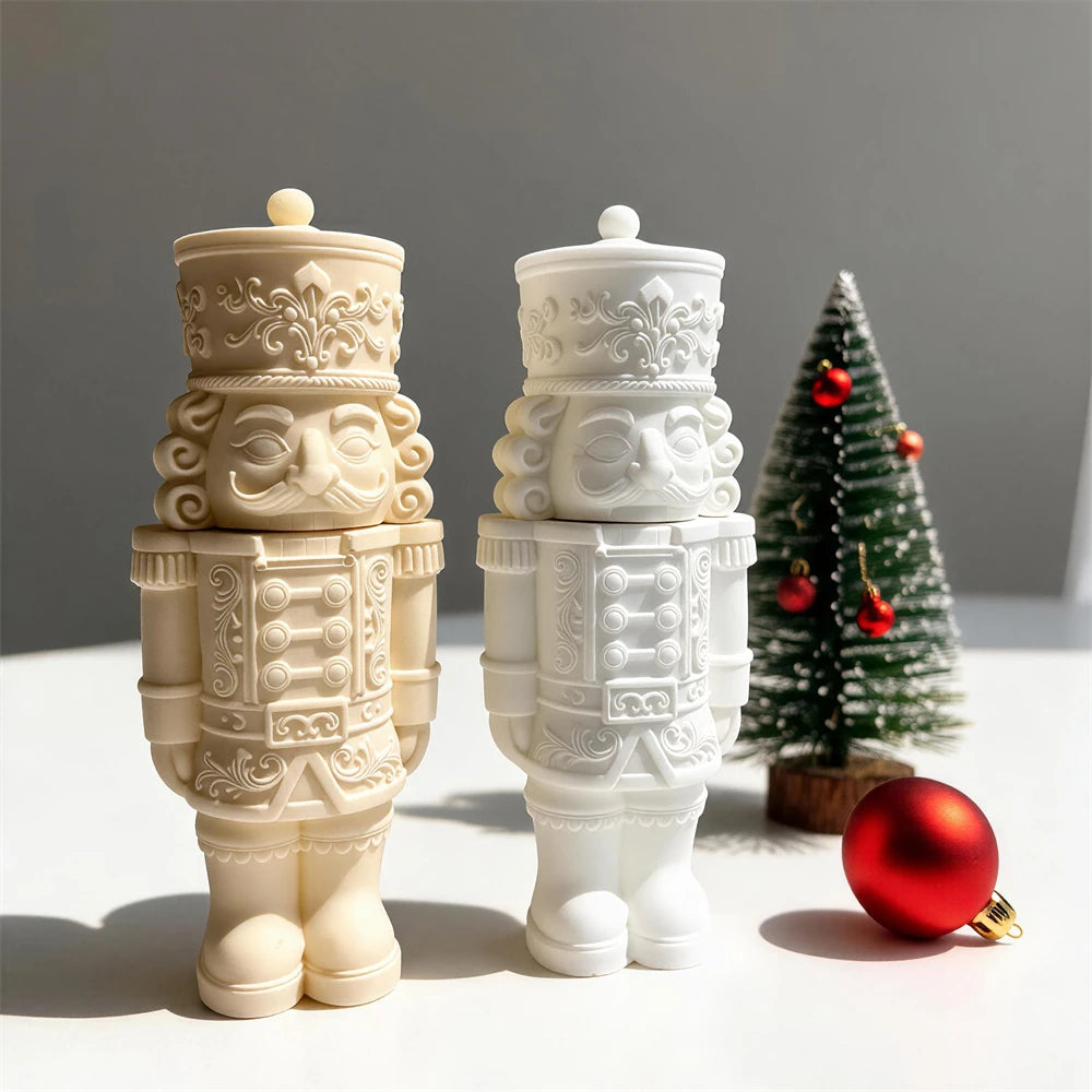 Two nutcracker soldier lidded ornaments with carved faces and boots