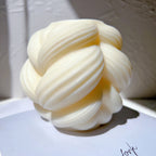 Close view of fine ribbing over overlapping swirl sections