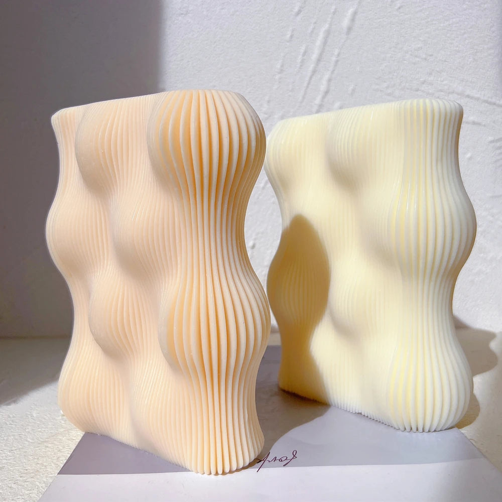 Two bubble wave block castings with fine vertical ribs