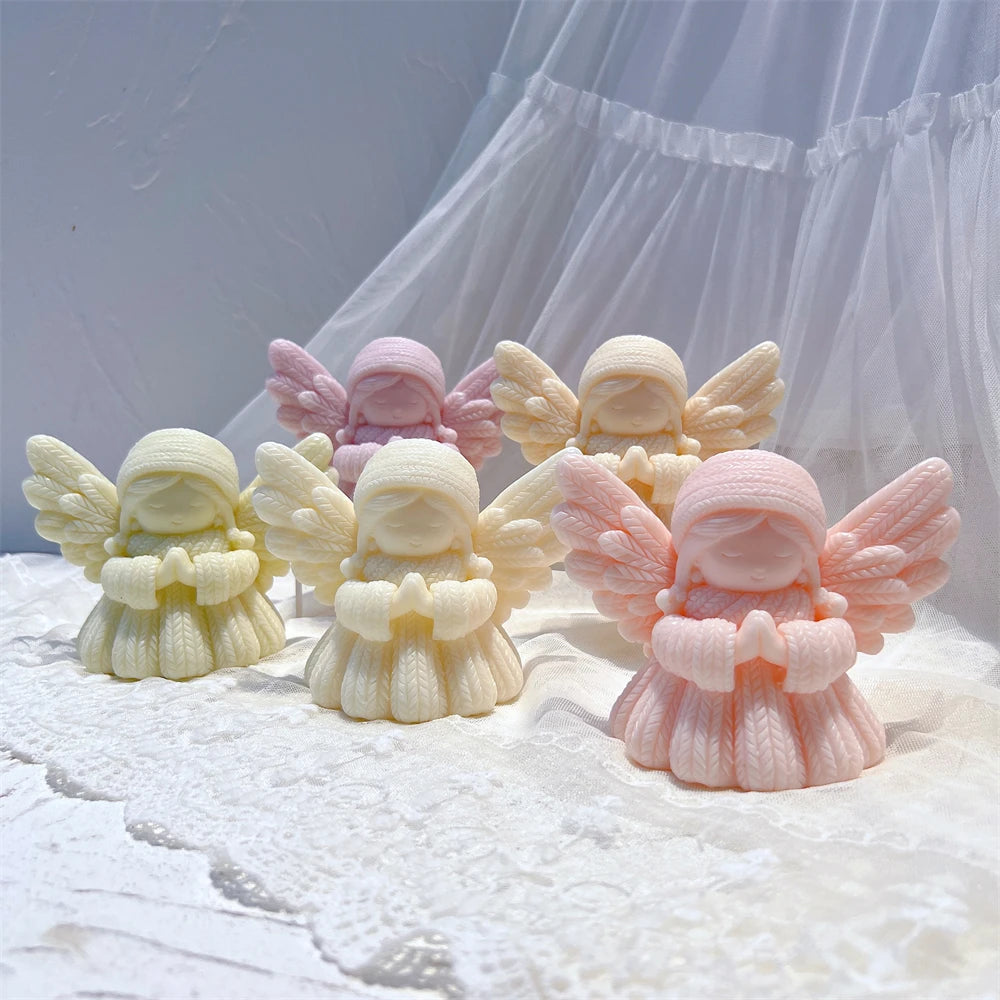 Front view of pastel angels with textured robes and rounded heads