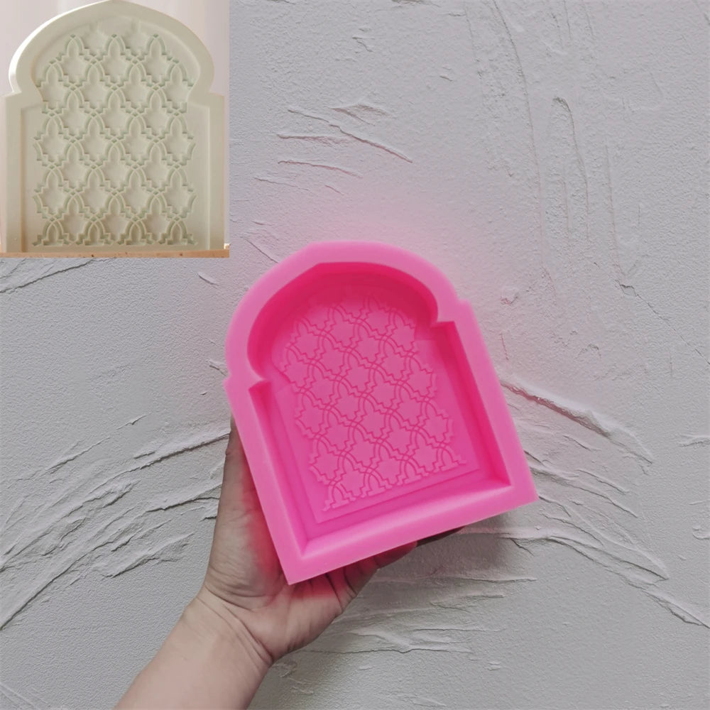 Pink silicone Arched Lattice Plaque mold with repeating lattice detail