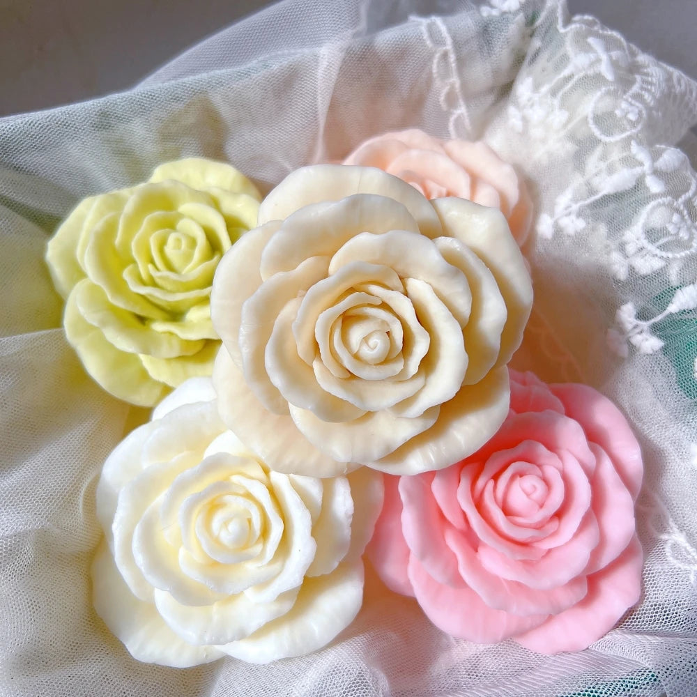 Cream rose castings with pink and green flower examples