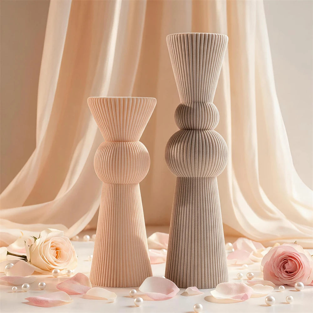 Short and tall ribbed sphere candles displayed together