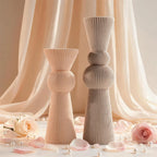 Short and tall ribbed sphere candles displayed together