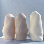 Front view of cream, gray and pale green wave forms