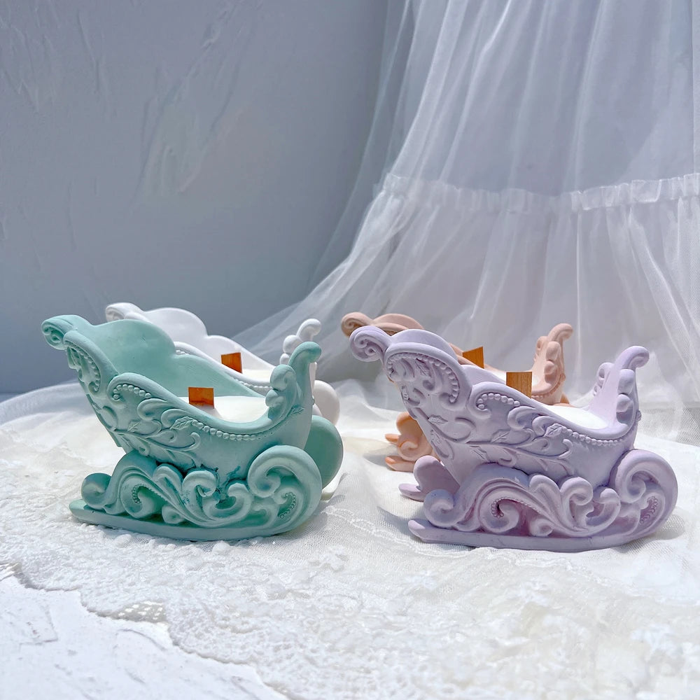Sleigh vessels showing decorative scrollwork and runners