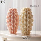 Wavy pillar size-reference graphic with tall candle examples