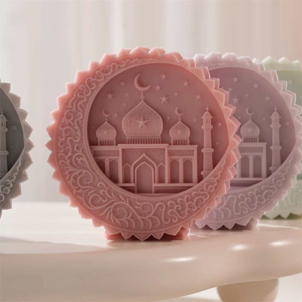 Pink round medallion candle with raised arched design detail