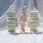 Tall standing nutcracker sample beside separate shorter nutcracker designs