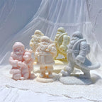 Walking Santa castings displayed from front and side angles