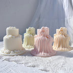 Tiered cake reverse beside long princess gown castings