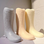 Three boot castings showing heel and sole detail