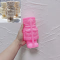 Pink silicone mold for stout nutcracker soldier with boots and broad hat