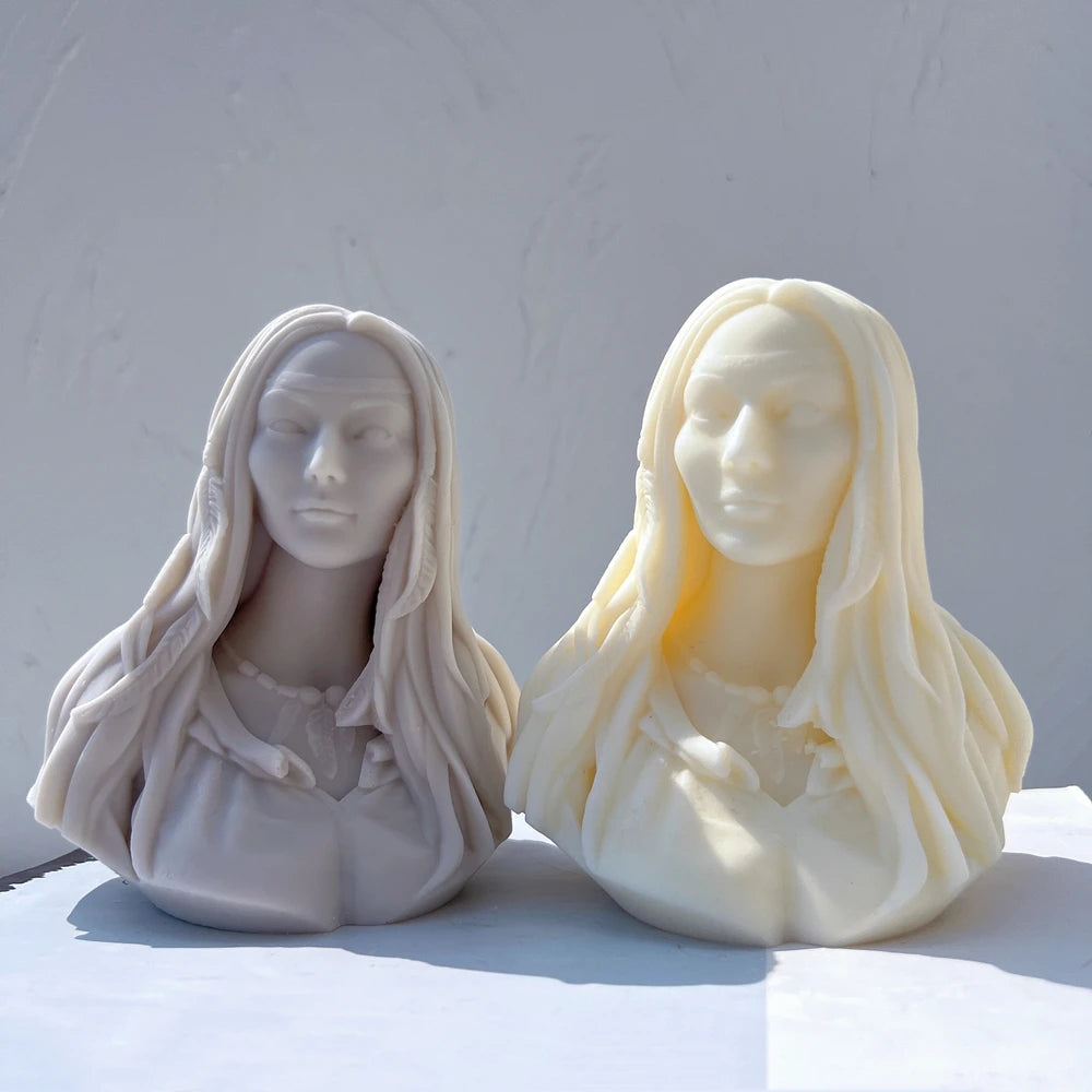 Front view of two female busts with draped necklines