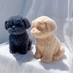 Angled puppy castings showing floppy ears and sculpted chest fur