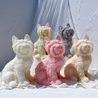 Seated Yorkshire terrier candle figures in pastel colors