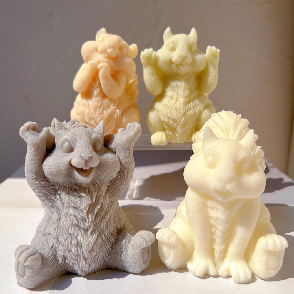 Playful squirrel figurine candle samples with different front paw positions