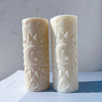 Two moon mandala pillar castings with flat circular tops