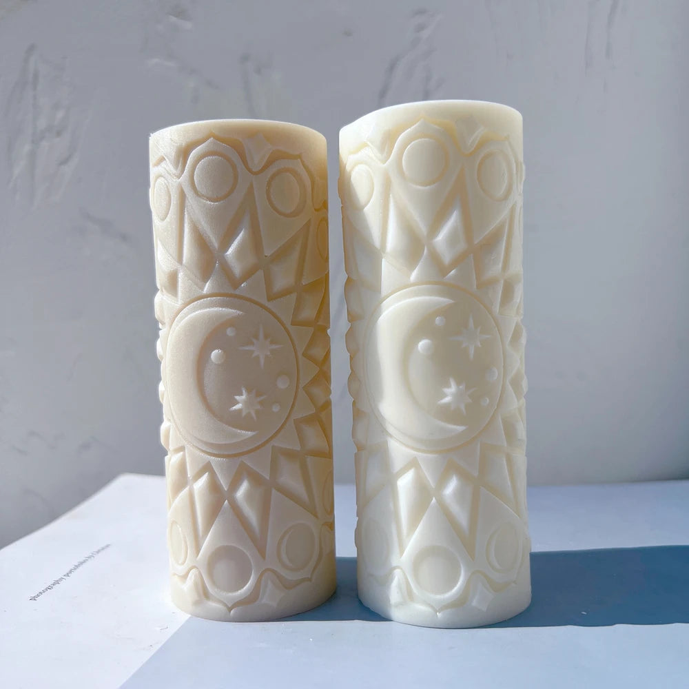 Two moon mandala pillar castings with flat circular tops