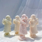 Santa castings showing decorated coats and gift sacks