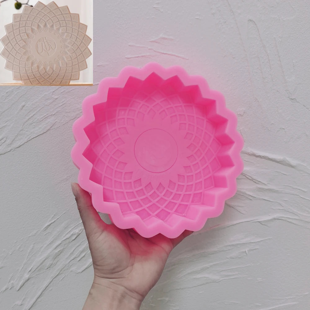 Pink silicone Sunburst Script Plaque mold with a pointed circular rim