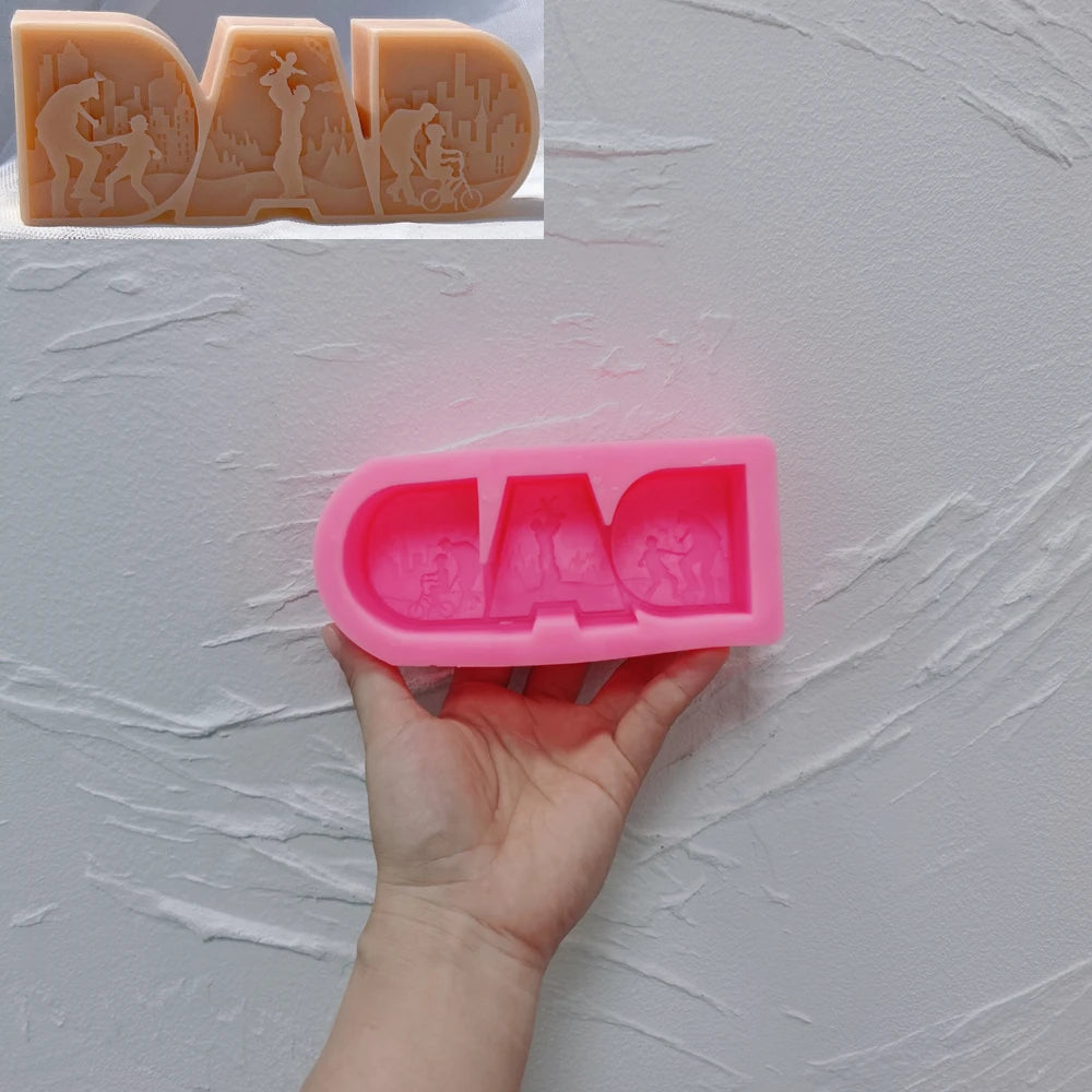 Pink silicone mold for DAD lettering with family-scene relief