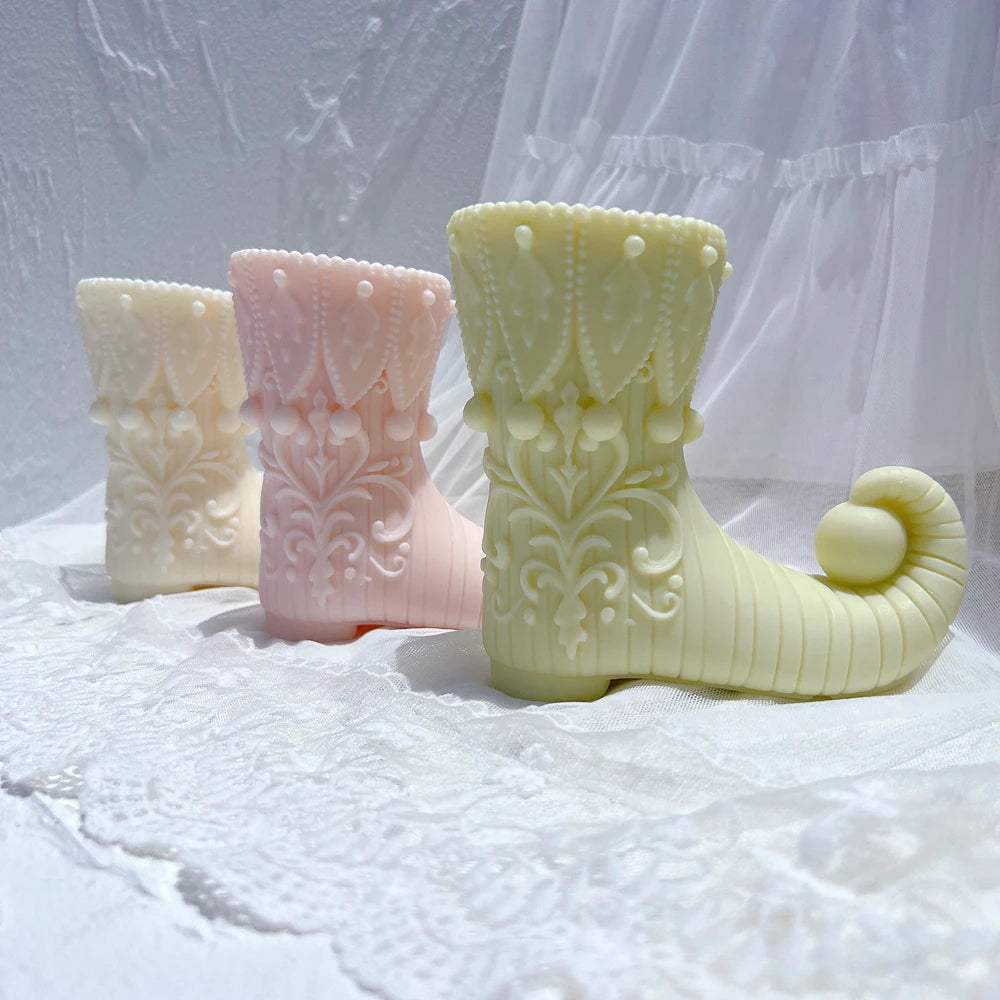 Rear and side views of decorative elf boots
