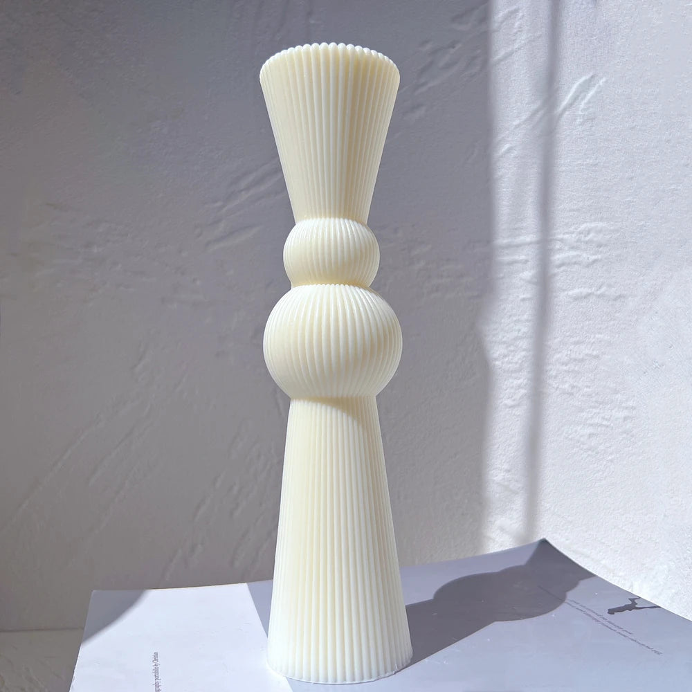 Double-sphere ribbed casting with flared top and tapered base