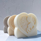 Front view of heart-framed mother profiles
