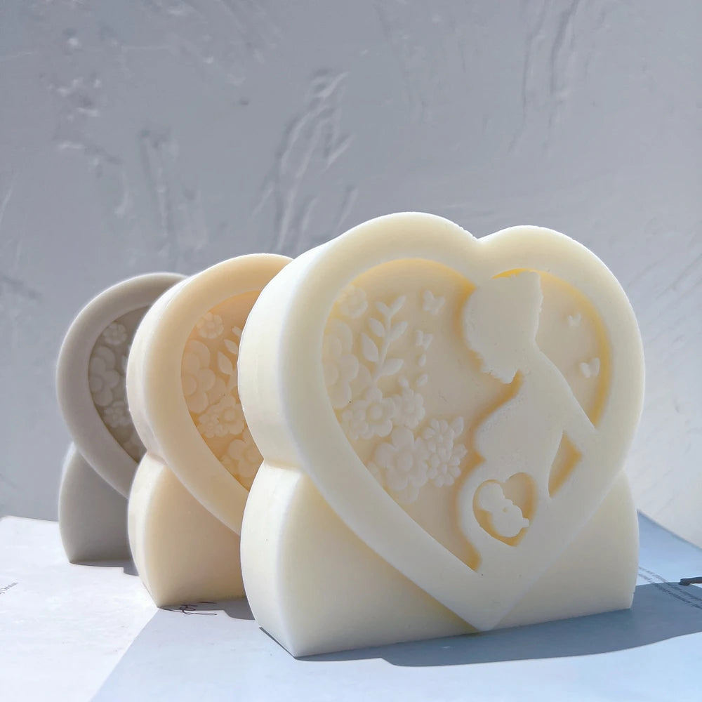 Front view of heart-framed mother profiles