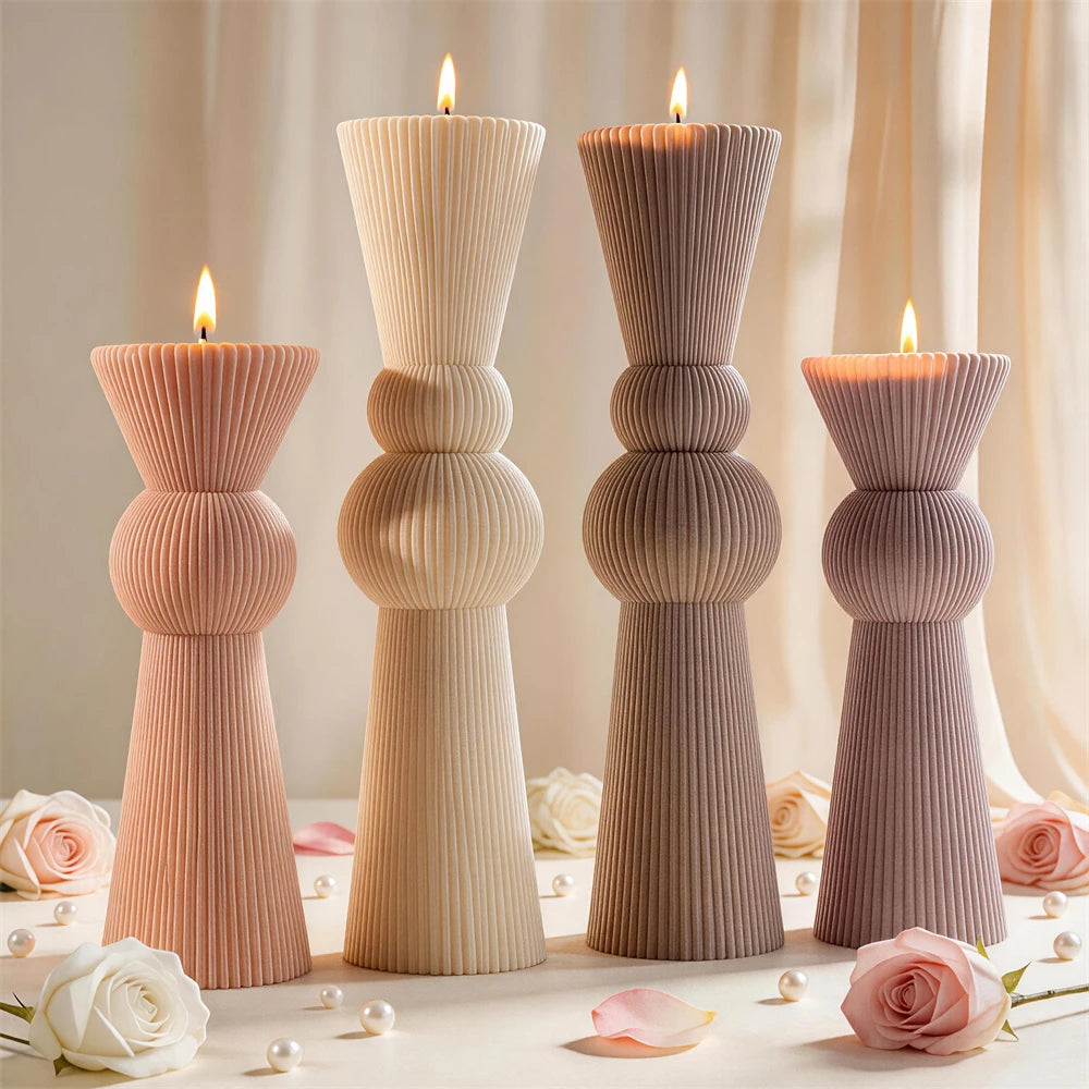 Four ribbed sphere candles showing the two sculptural profiles
