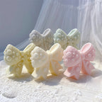 Close-up of textured bow loops and sculpted knots