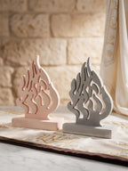 Front view of decorative flame silhouettes with flowing cutout shapes