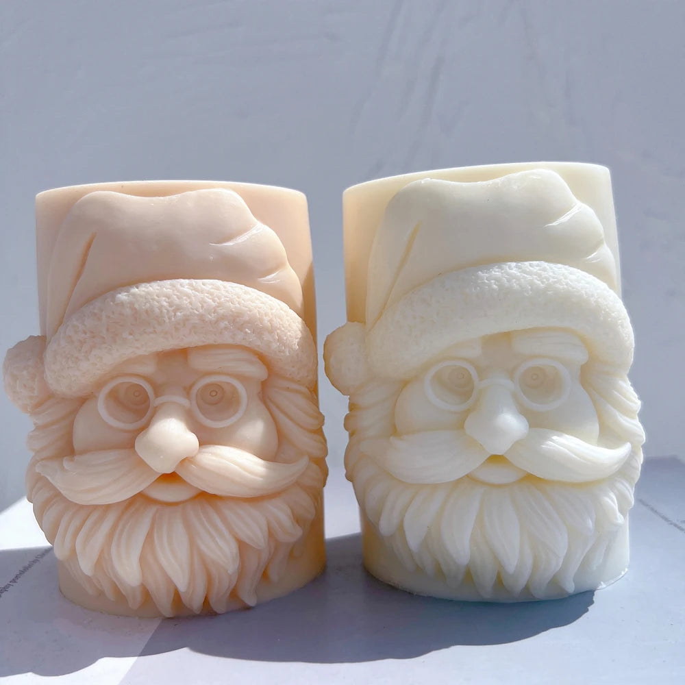 Santa pillar candles with glasses and curled moustaches