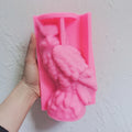 Pink silicone owl mold showing feather and perch cavities