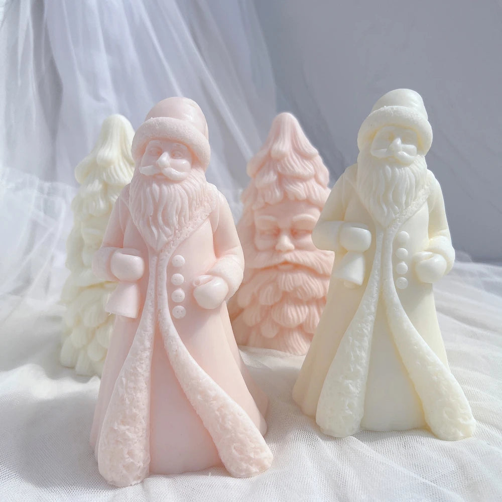 Two buttoned-coat Santa figures beside separate Christmas tree decorations
