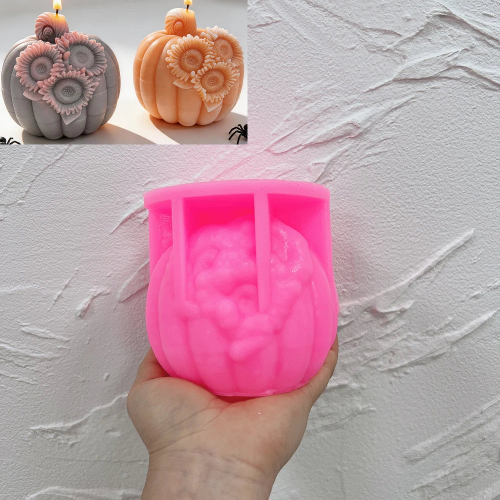 Pink three-sunflower pumpkin silicone mold held in one hand
