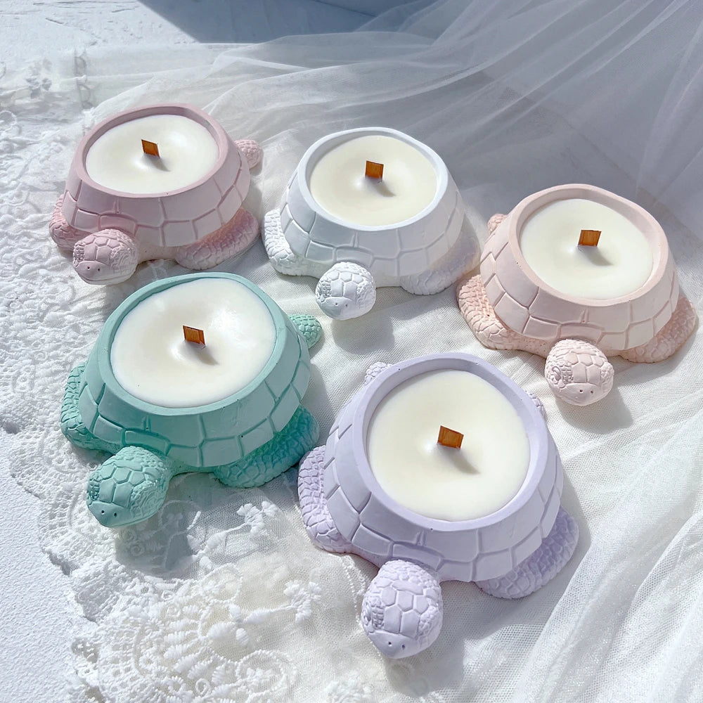Five turtle-shaped vessels with white wax fills