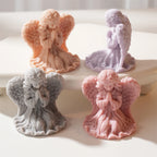Two praying girl angel candles with folded hands and wings